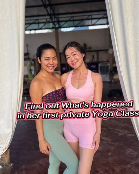 Kai with a student after her first private yoga class
